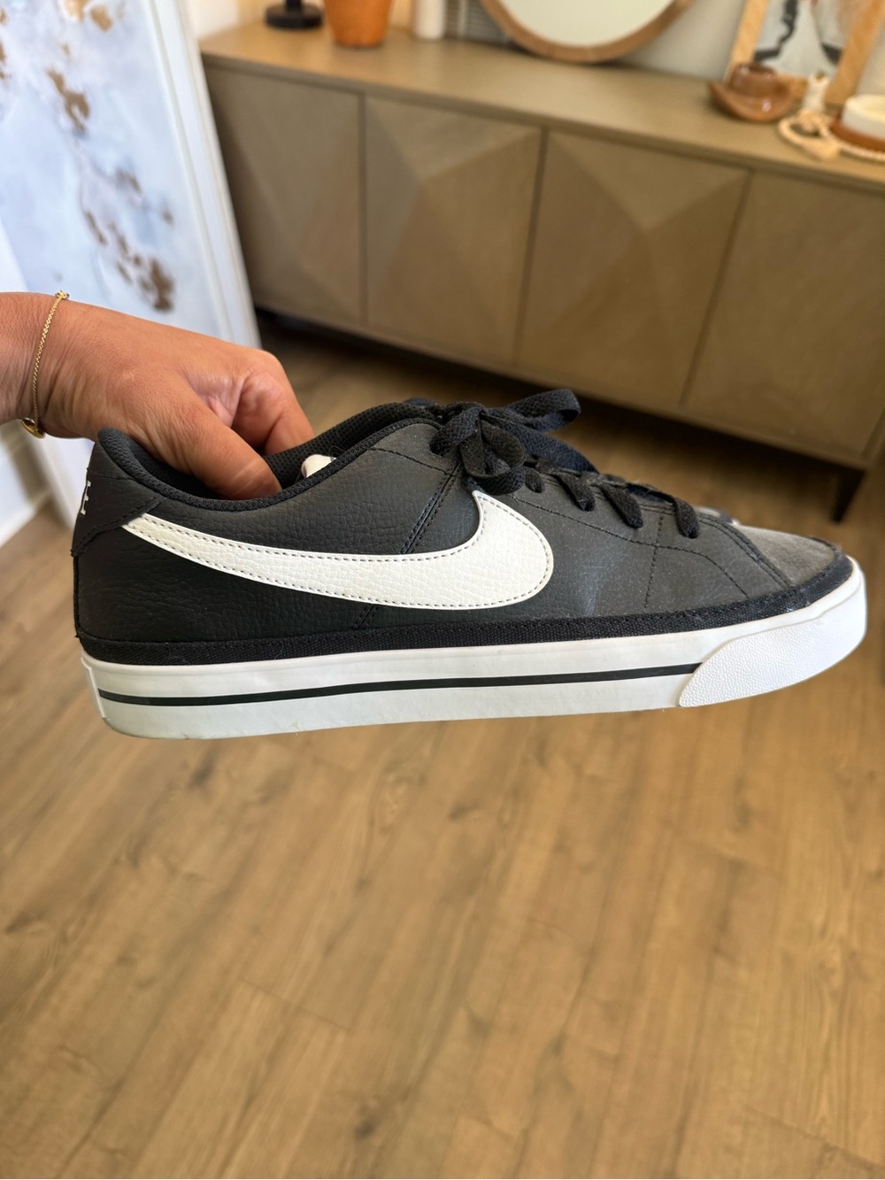 Nike Black Low-Top Sneakers with White Swoosh